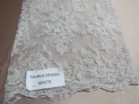 Gorgeous white French design embroider and beaded on a mesh lace. Wedding/Bridal/Prom/Nightgown fabric.